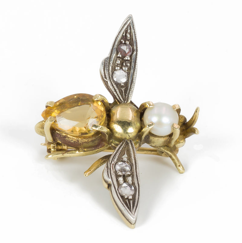 Spilla vintage a forma di mosca in oro e argento con rosette di diamante e topazio, anni 40