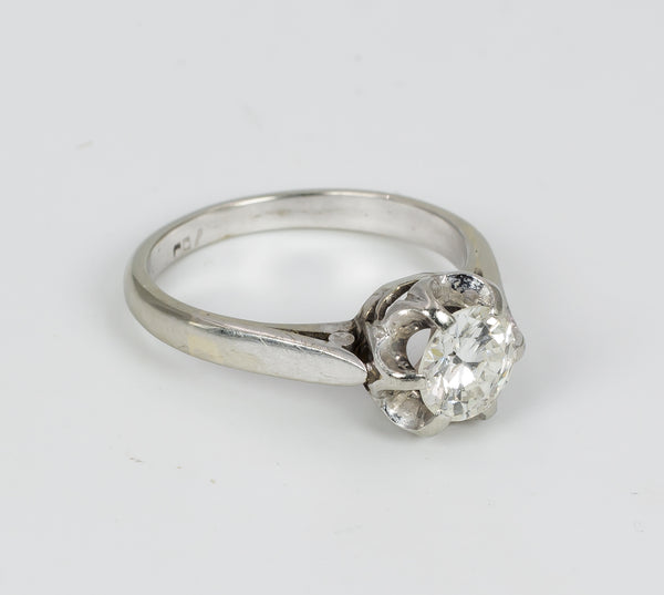 Vintage white gold ring with central 0.6 ct brilliant cut diamond, 1950s