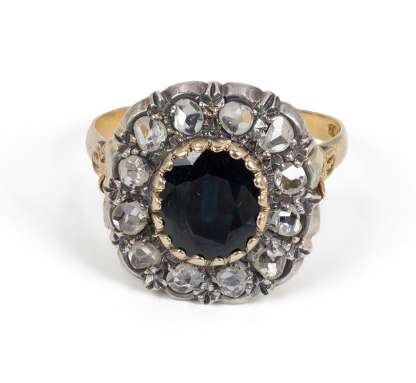 Antique gold and silver ring with diamond and sapphire rosettes, early 1900s