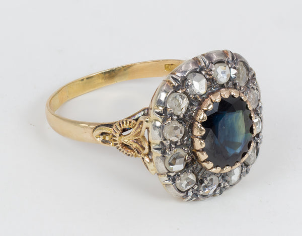 Antique gold and silver ring with diamond and sapphire rosettes, early 1900s