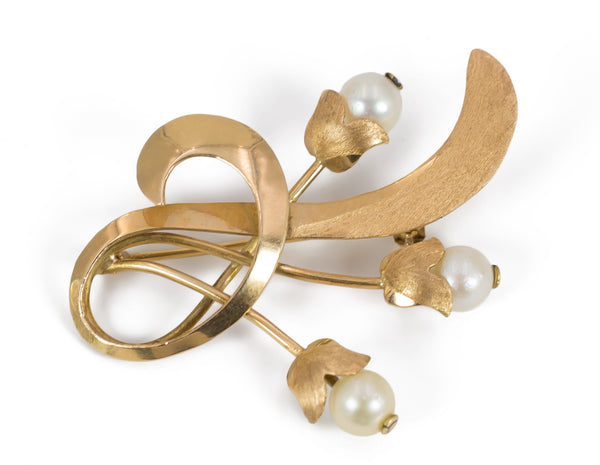 Vintage brooch in 18k gold with pearls. 50s