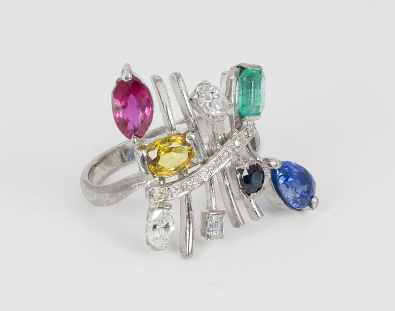 Vintage white gold ring with diamonds, sapphires, ruby, emerald and topaz. 70's