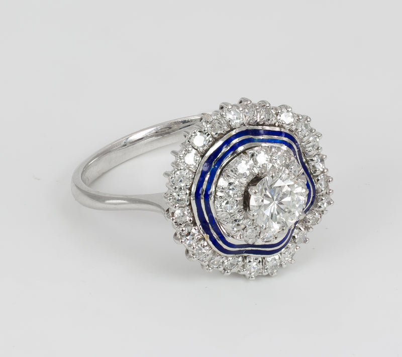 Vintage ring in white gold with diamonds (central 0.56 ct) and enamels. 40s