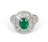 Vintage Weißgoldring mit Smaragd und Diamanten im Brillant- und Baguetteschliff