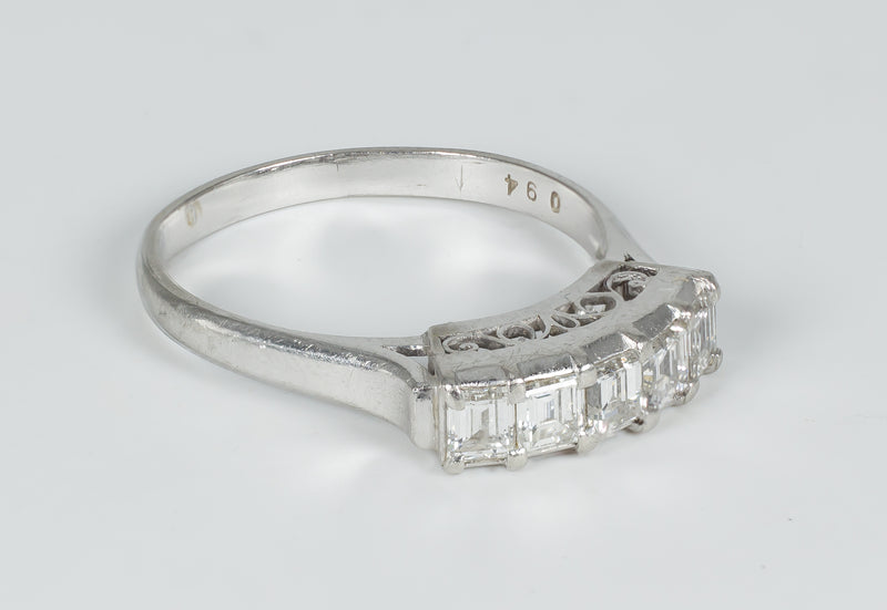 Vintage platinum ring with emerald cut diamonds (0.8ct), 1930s