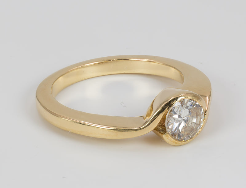 Vintage 18k gold ring with a brilliant cut diamond of approx. 0.7 ct. 70's