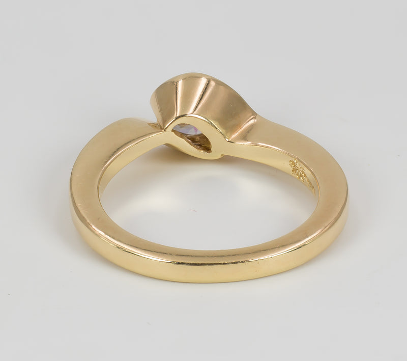 Anello vintage in oro 18k con diamante taglio brillante di circa 0.7 ct. Anni 70