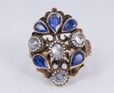 Antique 18k gold ring with pear cut sapphires and diamond rosettes, 30s - Antichità Galliera
