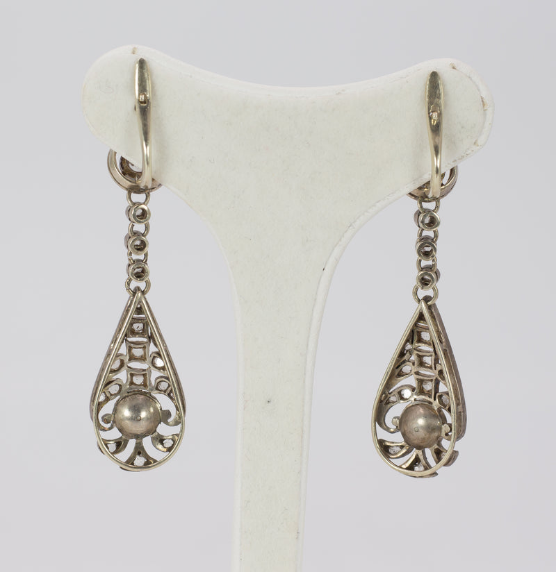 Liberty earrings in gold and silver with diamond and pearl rosettes