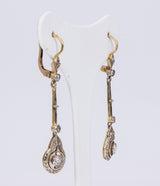 Orecchini liberty in oro e argento con diamanti taglio brillante (0.40 ct)  e rosette - Antichità Galliera