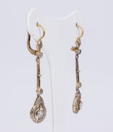 Liberty earrings in gold and silver with brilliant cut diamonds (0.40 ct) and rosettes - Antichità Galliera