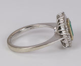 Vintage Ring aus 18 Karat Gold mit Diamanten im Smaragd- und Brillantschliff (ca. 0.6 ct), 50er Jahre