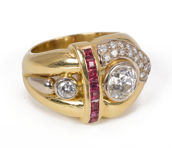 Vintage ring in 18k gold with central (1.28ct) and lateral (0.15ct) diamond and pavè of diamonds and rubies, 1970s