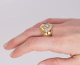 Vintage Ring aus 18 Karat Gold mit zentralem (1.28 Karat) und seitlichem (0,15 Karat) Diamant und Pavé aus Diamanten und Rubinen, 70er Jahre