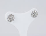 18k gold earrings with central diamonds (0.50 ct) and rosettes, 50s