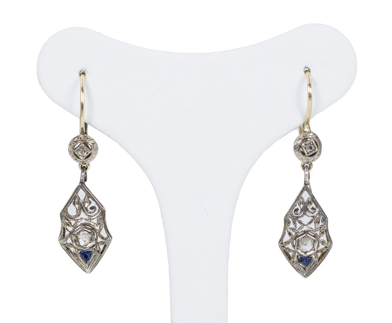 Liberty earrings in gold and silver with diamond and topaz rosettes