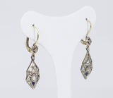 Liberty earrings in gold and silver with diamond and topaz rosettes