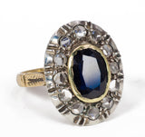 Vintage Ring aus 18 Karat Gold und Silber mit zentralen Saphir- und seitlichen Diamantrosetten, 50er Jahre