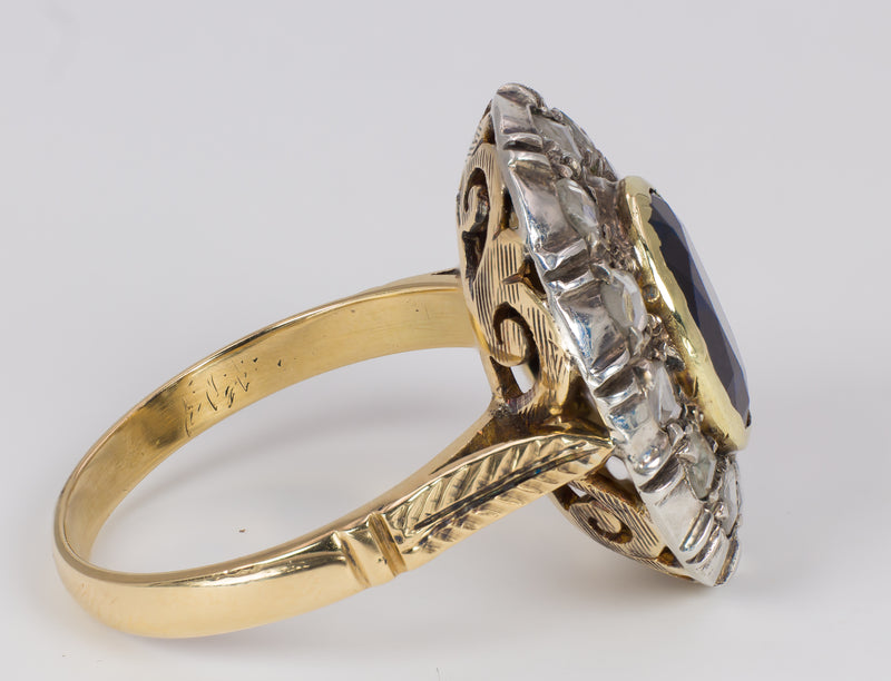 Anello vintage in oro 18k e argento con zaffiro centrale e rosette di diamante laterali, anni 50