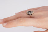 Vintage Ring aus 18 Karat Gold mit zentralen Saphir- und Diamantrosetten, 40er Jahre