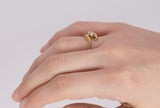 Vintage 18k gold ring with central brilliant cut diamond (0.20 ct), 70s.