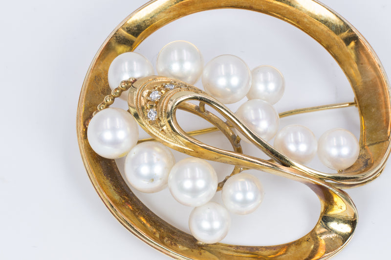 Spilla vintage in oro 18k con perle akoya e diamanti  , anni 70