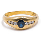 Vintage 18kt yellow gold ring with central sapphire and diamonds (0.10ctw), 1970s