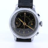 Montre-bracelet chronographe vintage avec cadran noir, années 1940