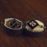 Orecchini in stile antico in oro 9K, argento, onice e diamanti - Antichità Galliera
