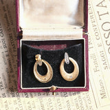 Vintage 14K gold earrings with brilliant cut diamonds (0.20ctw approx.), 60s / 70s