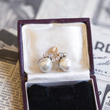 Antique 18K gold earrings with scaramazze pearls and diamonds, early 1900s