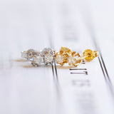 Orecchini punto luce in oro bianco 18K con diamanti di taglio vecchio (0.38ct)