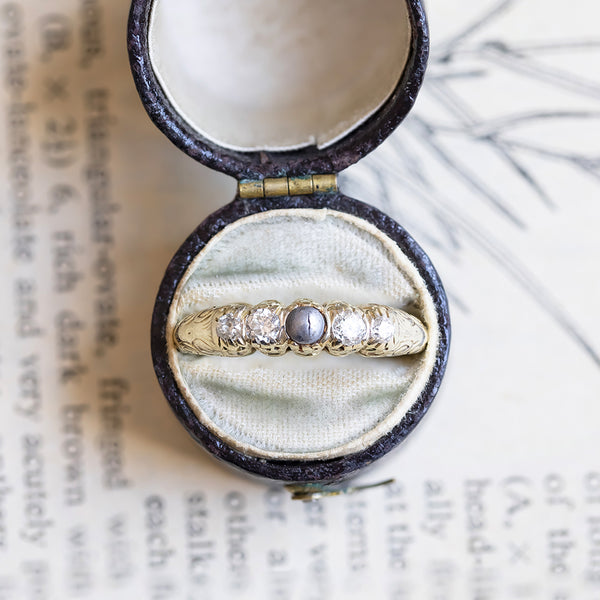 Antique 14K gold riviera ring with black bead and old cut diamonds (0.20ctw approx.), Early 1900s