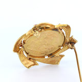 Vintage 18 Karat Gold Brosche mit 24 Karat Gold Britisches Pfund und Rubine. Ende der 60er Jahre