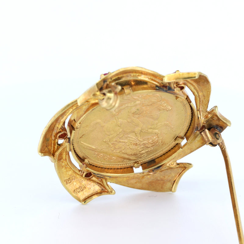 Broche vintage en or 18 carats avec livre sterling en or 24 carats et rubis. fin des années 60