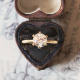 Solitaire in 18K gold with 1.67ct brilliant cut diamond