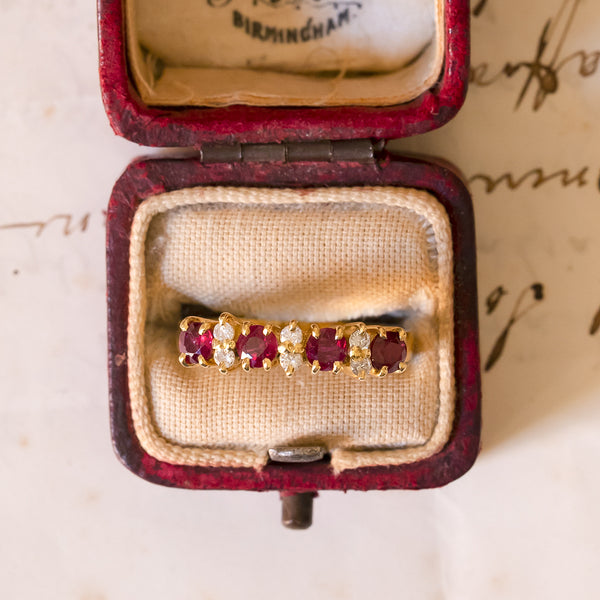 Pair of 18K yellow gold rings with rubies, sapphires and diamonds (0.24ctw approx.), 1960s / 70s