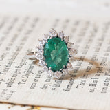 18K white gold daisy ring with emerald (4.47ct) and brilliant cut diamonds (0.76ct)