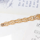 Bracelet vintage en or jaune et blanc 18 carats avec saphirs (env. 2.60 ct) et diamants (env. 1 ct), années 60