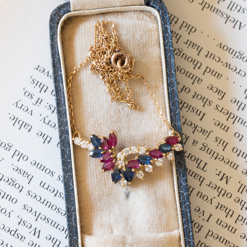 Collier vintage in oro 18K con rubini, zaffiri e diamanti (0.30ctw ca.), anni ‘70/‘80