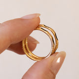 Pair of antique rings in 18K gold with black stones, early 1900s