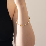 Semi-rigid vintage 14K gold bracelet with pearls, 70s