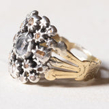 Vintage-Ring im antiken Stil aus 18 Karat Gold und Silber mit einem zentralen Diamanten im Brillantschliff (ca. 0.30 ct) und Diamanten im Rosettenschliff