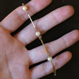 Полужесткий винтажный браслет из 14-каратного золота с жемчугом, 70-е гг.