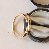 Pair of antique rings in 18K gold with black stones, early 1900s