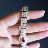 Полужесткий винтажный браслет из белого золота 18 карат с натуральным рубином (около 0.90 карата) и бриллиантами (около 6.30 карата), 60-е годы