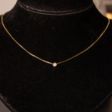 Collier vintage en or 14 carats avec un point lumineux d'environ 0.10 ct, années 70/80