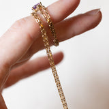 Demi Parure mit vergoldeter Halskette mit 18 Karat Goldanhänger mit Amethyst und mit vergoldeten Ohrringen mit Amethysten, 60er/70er Jahre
