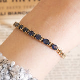 Halbstarres Vintage-Armband aus 14 Karat Gelbgold mit Saphiren (ca. 3.60 ctw) und Diamanten, 60er/70er Jahre