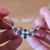 Vintage 14K white gold necklace with diamonds (approx. 0.80ctw) and sapphires, 60s